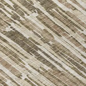 Photo of 8' Brown And Taupe Round Abstract Washable Indoor Outdoor Area Rug