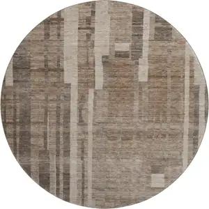 Photo of 8' Brown And Taupe Striped Washable Round Rug With UV Protection
