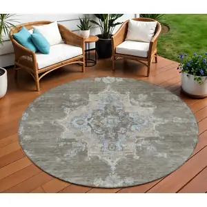 Photo of 8' Brown Beige And Blue Round Medallion Washable Indoor Outdoor Area Rug