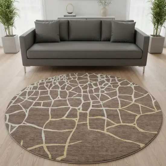 8' Brown Beige And Gold Abstract Geometric Washable Round Rug With UV Protection Photo 2
