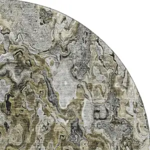 Photo of 8' Brown Beige And Gray Abstract Washable Round Rug With UV Protection