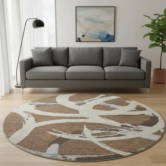 8' Brown Beige And Gray Abstract Washable Round Rug With UV Protection Photo 2