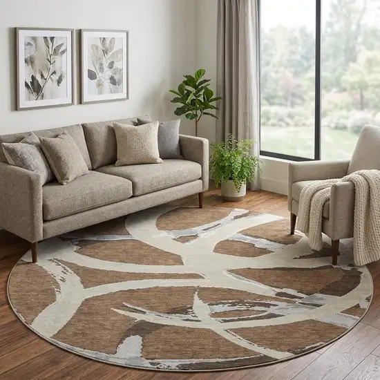 8' Brown Beige And Gray Abstract Washable Round Rug With UV Protection Photo 1