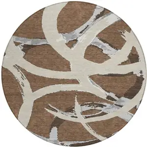 Photo of 8' Brown Beige And Gray Round Abstract Washable Indoor Outdoor Area Rug