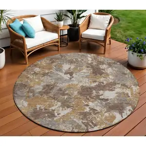 Photo of 8' Brown Beige And Gray Round Floral Washable Indoor Outdoor Area Rug
