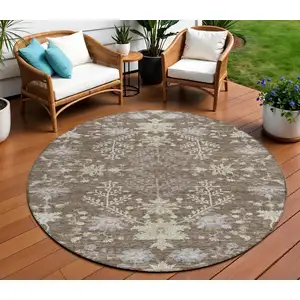 Photo of 8' Brown Beige And Green Round Floral Washable Indoor Outdoor Area Rug