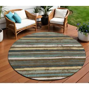 Photo of 8' Brown Beige And Green Round Striped Washable Indoor Outdoor Area Rug