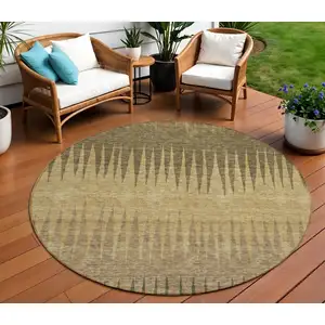 Photo of 8' Brown Beige And Green Round Striped Washable Indoor Outdoor Area Rug