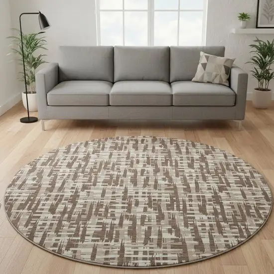 8' Brown Beige And Ivory Abstract Geometric Washable Round Rug With UV Protection Photo 2