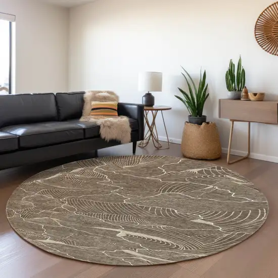 8' Brown Beige And Ivory Abstract Washable Round Rug With UV Protection Photo 4