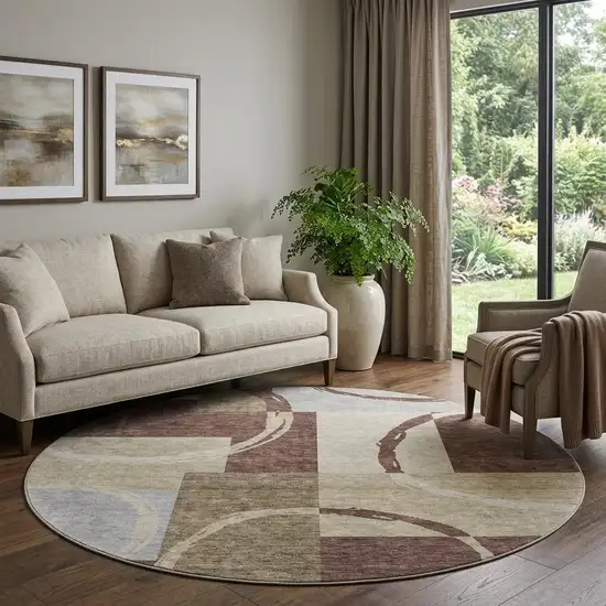 8' Brown Beige And Ivory Geometric Washable Round Rug With UV Protection Photo 1