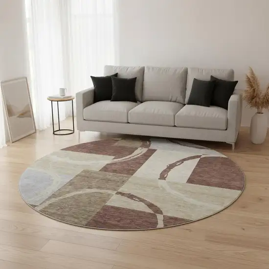 8' Brown Beige And Ivory Geometric Washable Round Rug With UV Protection Photo 2