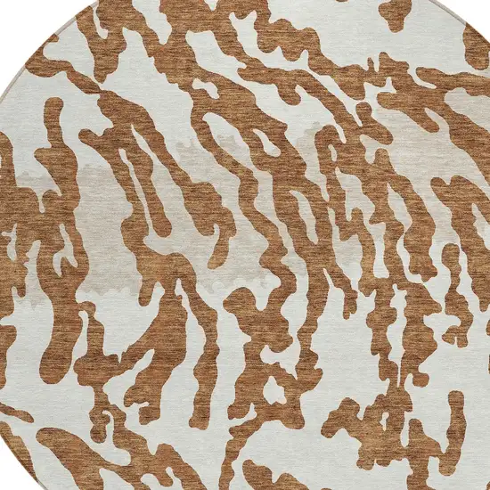 8' Brown Beige And Ivory Round Animal Print Washable Indoor Outdoor Area Rug Photo 3