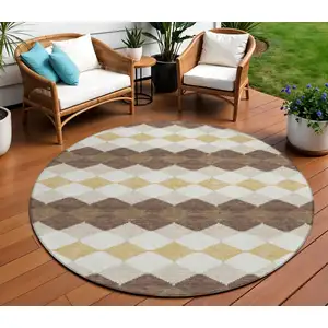 Photo of 8' Brown Beige And Ivory Round Geometric Washable Indoor Outdoor Area Rug