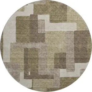 Photo of 8' Brown Beige And Taupe Abstract Geometric Washable Round Rug With UV Protection