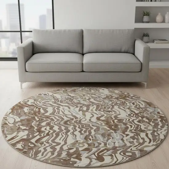 8' Brown Beige And Taupe Abstract Washable Round Rug With UV Protection Photo 2