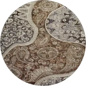 Photo of 8' Brown Beige And Taupe Paisley Washable Round Rug With UV Protection