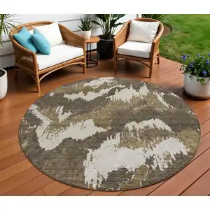 Photo of 8' Brown Beige And Taupe Round Abstract Washable Indoor Outdoor Area Rug