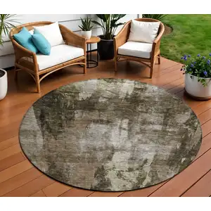 Photo of 8' Brown Black And Beige Round Abstract Washable Indoor Outdoor Area Rug