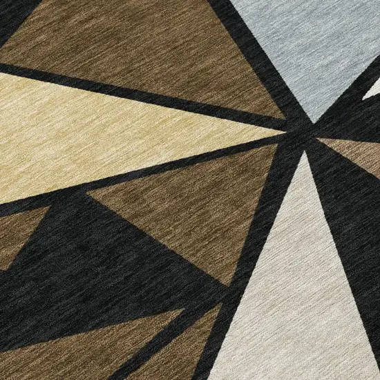 8' Brown Black And Ivory Round Geometric Washable Indoor Outdoor Area Rug Photo 4