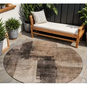 Photo of 8' Brown Black And Tan Round Abstract Washable Indoor Outdoor Area Rug