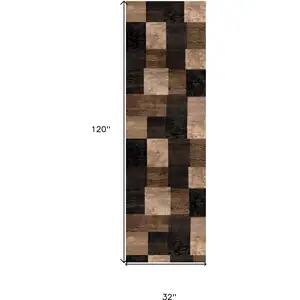 Photo of 10' Brown Black and Tan Geometric Power Loom Runner Rug