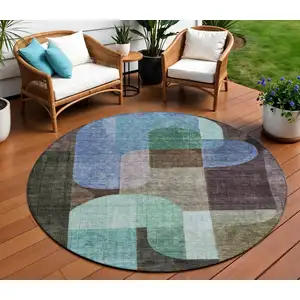 Photo of 8' Brown Blue And Green Round Abstract Washable Indoor Outdoor Area Rug