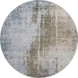 Photo of 8' Brown Blue And Taupe Abstract Washable Round Rug With UV Protection