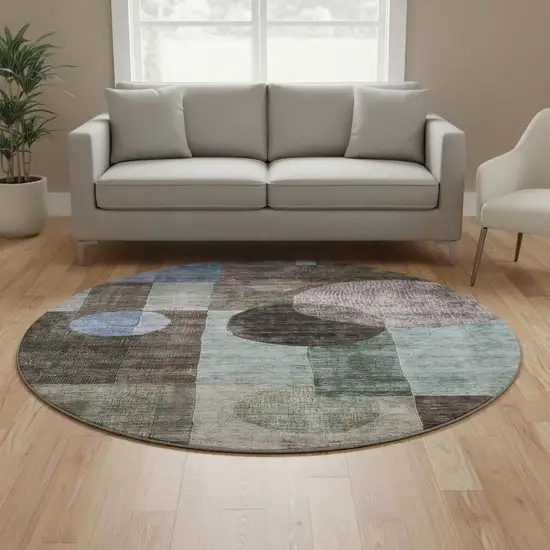 8' Brown Blue And Taupe Geometric Washable Round Rug With UV Protection Photo 2