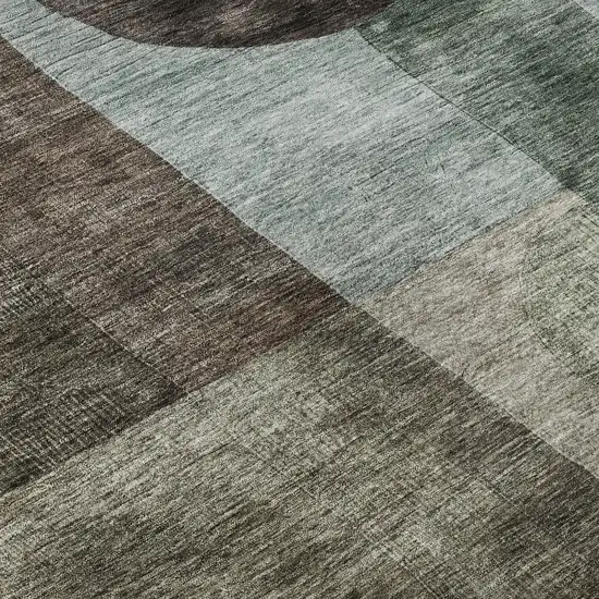 8' Brown Blue And Taupe Geometric Washable Round Rug With UV Protection Photo 7