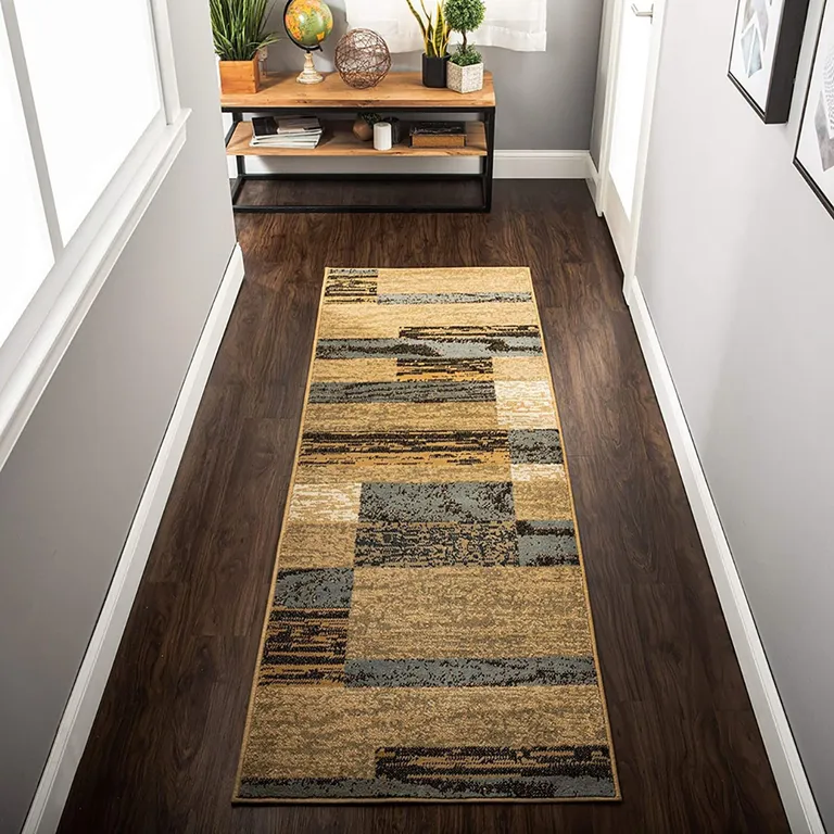 12' Brown Blue and Beige Patchwork Stain Resistant Runner Rug Photo 3