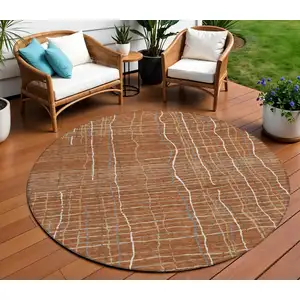 Photo of 8' Brown Copper And Gray Round Striped Washable Indoor Outdoor Area Rug