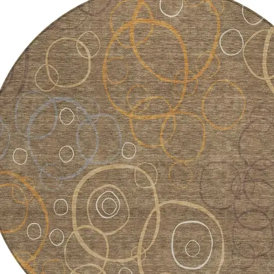 8' Brown Copper And Ivory Round Geometric Washable Indoor Outdoor Area Rug Photo 2