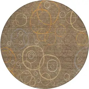 Photo of 8' Brown Copper And Ivory Round Geometric Washable Indoor Outdoor Area Rug