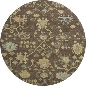 Photo of 8' Brown Gold And Blue Floral Washable Round Rug With UV Protection