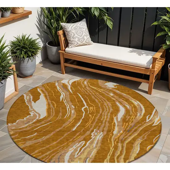 8' Brown Gold And Copper Round Abstract Washable Indoor Outdoor Area Rug Photo 1