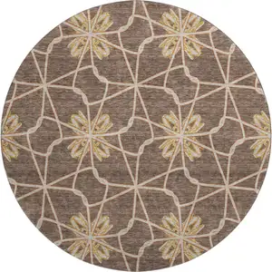 Photo of 8' Brown Gold And Gray Geometric Washable Round Rug With UV Protection