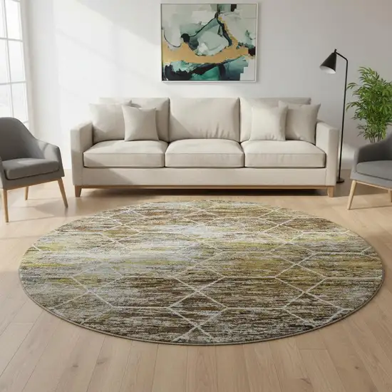 8' Brown Gold And Ivory Geometric Washable Round Rug With UV Protection Photo 2