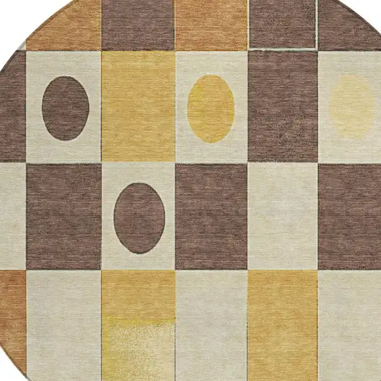 8' Brown Gold And Ivory Round Geometric Washable Indoor Outdoor Area Rug Photo 5