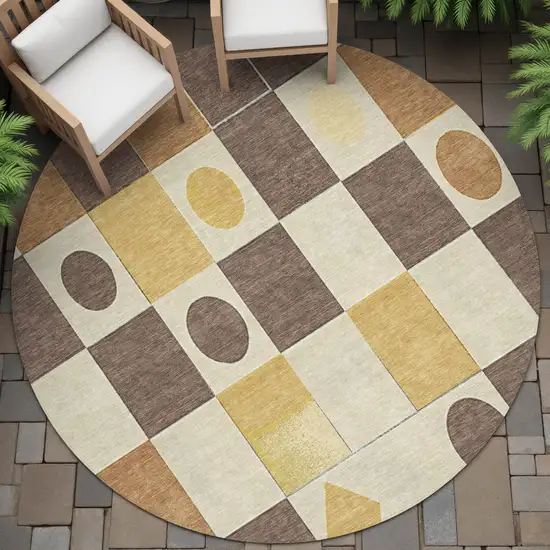 8' Brown Gold And Ivory Round Geometric Washable Indoor Outdoor Area Rug Photo 9