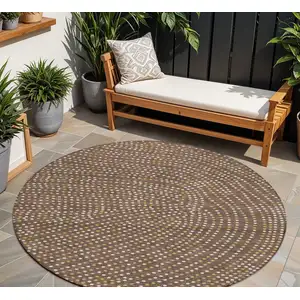 Photo of 8' Brown Gold And Ivory Round Polka Dot Washable Indoor Outdoor Area Rug
