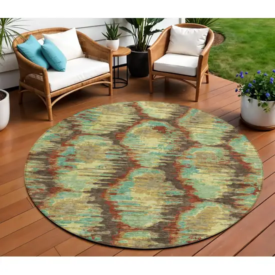 8' Brown Gold And Teal Blue Round Abstract Washable Indoor Outdoor Area Rug Photo 1
