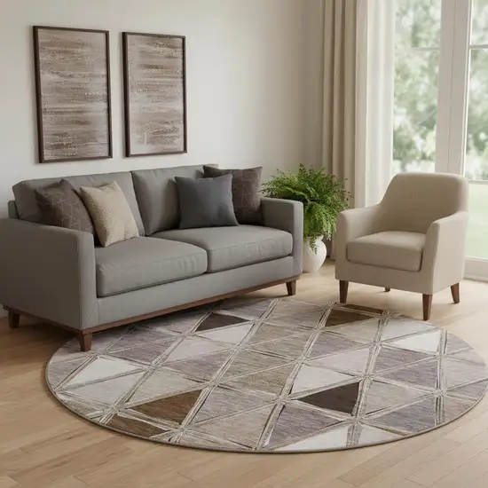 8' Brown Gray And Ivory Geometric Washable Round Rug With UV Protection Photo 1