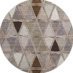 Photo of 8' Brown Gray And Ivory Geometric Washable Round Rug With UV Protection