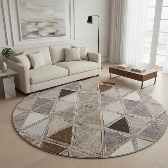 8' Brown Gray And Ivory Geometric Washable Round Rug With UV Protection Photo 2