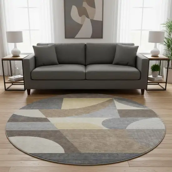 8' Brown Gray And Ivory Geometric Washable Round Rug With UV Protection Photo 2