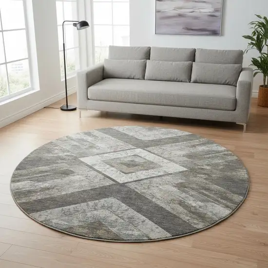 8' Brown Gray And Ivory Geometric Washable Round Rug With UV Protection Photo 2