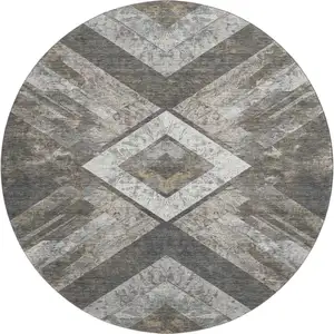 Photo of 8' Brown Gray And Ivory Geometric Washable Round Rug With UV Protection