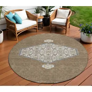 Photo of 8' Brown Gray And Ivory Round Oriental Washable Indoor Outdoor Area Rug