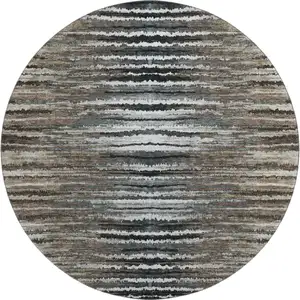 Photo of 8' Brown Gray And Ivory Striped Washable Round Rug With UV Protection